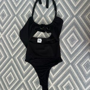 Woman’s black bodysuit